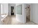 Bathroom with walk-in shower and soaking tub at 17903 W Solano Dr, Litchfield Park, AZ 85340