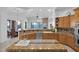 Large kitchen with an island and breakfast bar at 17903 W Solano Dr, Litchfield Park, AZ 85340
