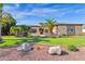 House exterior showcasing a front view and well-kept lawn at 17903 W Solano Dr, Litchfield Park, AZ 85340