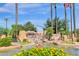 Russell Ranch entrance features a water feature and lush landscaping at 17903 W Solano Dr, Litchfield Park, AZ 85340