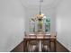 Bright dining room featuring a wood table and chandelier at 17903 W Solano Dr, Litchfield Park, AZ 85340