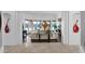 Open living area with large windows and hardwood floors at 17903 W Solano Dr, Litchfield Park, AZ 85340