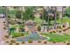 Aerial view of Russell Ranch entrance with pond and fountain at 17903 W Solano Dr, Litchfield Park, AZ 85340