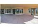 Large covered patio with access from multiple doors at 17903 W Solano Dr, Litchfield Park, AZ 85340