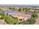 An aerial view showing the home's unique architectural features and landscaping at 17903 W Solano Dr, Litchfield Park, AZ 85340