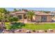 Stunning property with a large yard and mature landscaping at 17903 W Solano Dr, Litchfield Park, AZ 85340