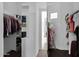 Large walk-in closet with ample shelving and hanging space at 17903 W Solano Dr, Litchfield Park, AZ 85340