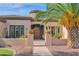 Elegant home exterior with a welcoming entryway at 17903 W Solano Dr, Litchfield Park, AZ 85340