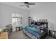 Spacious bedroom with built-in shelving and window at 17903 W Solano Dr, Litchfield Park, AZ 85340