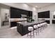 Modern kitchen with a large island and stainless steel appliances at 8332 E Sand Flower Dr # 20, Scottsdale, AZ 85266