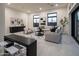 Open concept Gathering room with wet bar and large windows at 8332 E Sand Flower Dr # 20, Scottsdale, AZ 85266