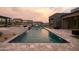 Relaxing swimming pool with a waterfall feature and spacious patio at 8332 E Sand Flower Dr # 20, Scottsdale, AZ 85266