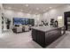 Modern kitchen with large island, stainless steel appliances, and views to the backyard at 8332 E Sand Flower Dr # 20, Scottsdale, AZ 85266