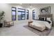 Spacious main bedroom with large windows and ensuite bathroom at 8332 E Sand Flower Dr # 20, Scottsdale, AZ 85266