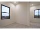 Spacious bedroom with two windows and neutral decor at 8332 E Sand Flower Dr # 20, Scottsdale, AZ 85266