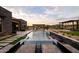 Luxury backyard oasis with a large pool and waterfall feature at 8332 E Sand Flower Dr # 20, Scottsdale, AZ 85266