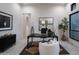 Spacious home office with large windows and modern decor at 8332 E Sand Flower Dr # 20, Scottsdale, AZ 85266