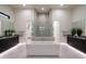 Luxurious bathroom with soaking tub, walk-in shower, and double vanity at 8332 E Sand Flower Dr # 20, Scottsdale, AZ 85266