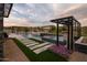 Luxury backyard with a large pool, spa, and multiple entertaining areas at 8332 E Sand Flower Dr # 20, Scottsdale, AZ 85266