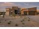 Modern home exterior with stone and stucco accents at 8332 E Sand Flower Dr # 20, Scottsdale, AZ 85266