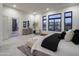 Bright main bedroom with large windows, ensuite bathroom and sitting area at 8332 E Sand Flower Dr # 20, Scottsdale, AZ 85266