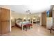 Spacious bedroom with mirrored closet doors and wood flooring at 4452 E Lincoln Dr, Paradise Valley, AZ 85253