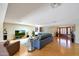 Spacious living area featuring hardwood floors and a view of the entry at 4452 E Lincoln Dr, Paradise Valley, AZ 85253