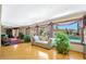 Relaxing living space with hardwood floors and views of the pool at 4452 E Lincoln Dr, Paradise Valley, AZ 85253