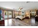 Main bedroom with patio access and pool view at 4452 E Lincoln Dr, Paradise Valley, AZ 85253