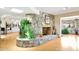 Stone fireplace creates a cozy focal point in the living area at 4452 E Lincoln Dr, Paradise Valley, AZ 85253