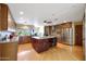 Well-equipped kitchen with granite countertops and ample cabinetry at 4452 E Lincoln Dr, Paradise Valley, AZ 85253