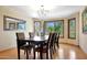 Bright dining room with large windows and hardwood floors at 4452 E Lincoln Dr, Paradise Valley, AZ 85253