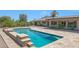 Inviting rectangular pool with flagstone decking at 4452 E Lincoln Dr, Paradise Valley, AZ 85253