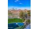 Scenic community pond with lush landscaping and mountain views at 2989 N 44Th St # 3036, Phoenix, AZ 85018