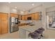 Modern kitchen with stainless steel appliances and a breakfast bar at 2989 N 44Th St # 3036, Phoenix, AZ 85018