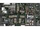 Aerial view of a community with multiple buildings, pools, and parking at 2989 N 44Th St # 3036, Phoenix, AZ 85018