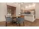 Well-equipped clubhouse kitchen with breakfast bar at 2989 N 44Th St # 3036, Phoenix, AZ 85018