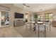 Open living room with dining area, view into bedroom and modern decor at 2989 N 44Th St # 3036, Phoenix, AZ 85018