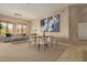 Bright living room with dining area and large windows at 2989 N 44Th St # 3036, Phoenix, AZ 85018