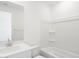 Clean bathroom with a bathtub, shower, and vanity at 37287 W Patterson St, Maricopa, AZ 85138