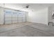Two-car garage with an automatic door opener at 37287 W Patterson St, Maricopa, AZ 85138