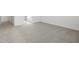 Well-lit bedroom featuring grey carpet at 37287 W Patterson St, Maricopa, AZ 85138
