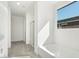 Bathroom with a bathtub, shower, and grey tile flooring at 37287 W Patterson St, Maricopa, AZ 85138