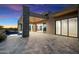 Luxury home with a large pool and spa, expansive patio, and stunning desert sunset views at 10249 E Joy Ranch Rd, Scottsdale, AZ 85262