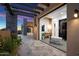Luxurious bathroom with a soaking tub and outdoor access at 10249 E Joy Ranch Rd, Scottsdale, AZ 85262