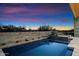 Stunning pool and spa with a picturesque desert sunset view at 10249 E Joy Ranch Rd, Scottsdale, AZ 85262