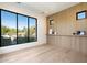 Bright office features wood wall accents, large window with scenic view, and light hardwood floors at 10249 E Joy Ranch Rd, Scottsdale, AZ 85262
