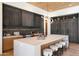 Spacious kitchen with light wood cabinets and a large island at 10249 E Joy Ranch Rd, Scottsdale, AZ 85262