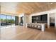 Modern kitchen with island, stainless steel appliances, and custom cabinetry at 10249 E Joy Ranch Rd, Scottsdale, AZ 85262