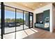 Modern wet bar with wine cooler and view of backyard at 10249 E Joy Ranch Rd, Scottsdale, AZ 85262